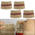 Foldable seagrass Christmas tree skirt with red plaid straps and pin connectors - Natural Woven Grass Christmas Tree Skirt
