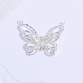 Close-up of S925 sterling silver butterfly pendant with sparkling cubic zirconia stones - Silver Double Loop Butterfly Pendant