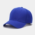Detail view of the six-panel blue cotton baseball cap with curved brim and ventilation holes - Blue
