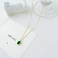 Minimalist gold necklace with a rectangular emerald green pendant in four-prong setting - 14K Gold + Green Zirconia