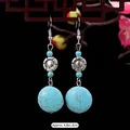 Bohemian vintage turquoise drop earrings with silver flower detail and fishhook clasp - 9-Large Flower Round Turquoise