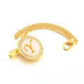 Detailed close-up of golden pacifier clip with rhinestone initial Y pendant on white surface - Letter Y