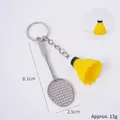 Miniatuur zilveren badmintonracket en gele shuttles sleutelhanger, lengte 8,1 cm - Gele Shuttle + Racket