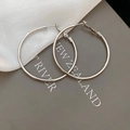 Close-up of minimalist silver hoop earrings on elegant silk fabric and card background - 5cm / Silver