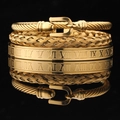 Detailed view of three gold-tone bracelets featuring Roman numerals and woven textures - Gold Horseshoe Buckle 3-Piece Set-1