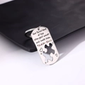 Macro shot of silver stainless steel keychain with heart and puzzle cutout for Autism Moms - Style 24 (Autism Mom Puzzle)