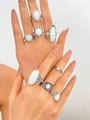 8-piece vintage silver ring set with white opal gemstones in a bohemian style - Bohemian Opal Antique Silver Stackable Ring Set (7921)