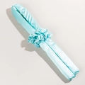 Detail of cyan silk heatless hair curler with matching scrunchie on beige background - Curler + 2 Scrunchies / Green