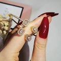 Sparkling zircon set with adjustable gold bangle and ring on female hand - Adjustable / Gold