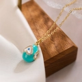Collana placcata oro 18K con ciondolo occhio del diavolo su seta bianca - Verde petrolio