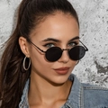 Retro round black sunglasses with a slim metal frame worn by a model in denim - Black Frame Full Grey