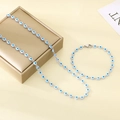 Evil eye jewelry set with blue and white enamel beads on a silver chain necklace and bracelet - White Blue