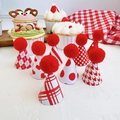 Detailed view of eight mini Christmas party hats with red pom-poms for cake decoration - Pom Pom Hat Set B