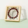 Goldstone bead bracelet with gold shimmer in a minimalist cream floating jewelry display box - 7x7x2cm / Turmeric