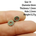 Macro detail of 8mm silver alloy spacer beads with intricate twisted rope texture - 14# (Dia 8mm Thick 1.5mm)