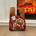 Detail of gingerbread man pattern on thick knit tote bag for Christmas holiday season - Red Brown Gingerbread Man
