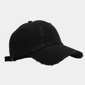 Close-up of distressed details and frayed edges on a black cotton twill baseball cap - Adjustable / Black