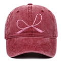 Close-up of bow embroidery and vintage washed cotton texture on the baseball cap - Adjustable / Burgundy