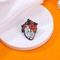 Enamel heart brooch with red roses and Heart Blood text on a white pedestal - Red Rose Heart Blood (C2542-3)
