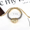 Adjustable golden beaded bracelet with matte heart pendant on yellow cord, 15-25cm - Gold
