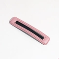Pink PU leather hair clip featuring a hollow center design and detailed hand stitching - Pink Leather