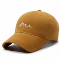 Caramel cotton baseball cap with white me embroidery in a classic 45-degree side view - Adjustable / Yellow Brown
