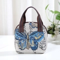 Ethnic style handbag with cream butterfly jacquard pattern and striped handles - Blue Butterfly