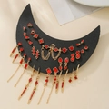Ensemble de boucles d'oreilles gothiques dorées avec gemmes rouges sur support - Ensemble de Boucles d'Oreilles Multi-pièces / Or Strass Rouge