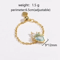 Vista tecnica dettagliata dell'anello a catena regolabile con pietra a goccia verde - Anello a Goccia d'Acqua con Catena in Oro / Goccia d'Acqua Blu Mare - Oro