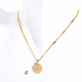 18K gold plated necklace with starburst coin pendant and pink birthstone on mannequin - October-Pink