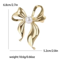 Elegante gouden strikbroche van legering met parel, inclusief afmetingen en het gewicht - Goud