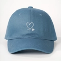 Blue cotton baseball cap with white heart embroidery for outdoor sun protection - One Size / Denim Blue
