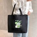 Large black canvas tote bag with cartoon cup illustration worn on shoulder - Bunny Cup - Black
