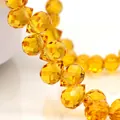 Amber faceted teardrop crystal glass beads with side holes for DIY jewelry making - Deep Golden / 6mm (approximately 87 Beads Per Strip)