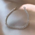Detailed shot of silver marquise-cut zircon tennis bracelet on soft silk background - BP5107 Platinum Plated [Zircon approx 5mm]