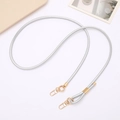 Detail of woven silver cord strap with premium gold metal swivel hooks for bags - Silver