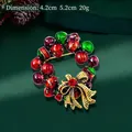 Christmas wreath brooch with red green enamel balls and a golden bow accent - Red Green Ball Wreath Style (QT0064)