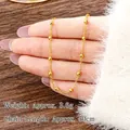 Golden beaded necklace 50cm long with 0.3cm gold beads weighing 3.6g on hand - Sparkling Disco Bead Necklace - Approx. 50cm (X4476)