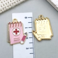 Pink enamel nurse notepad pendant in golden finish for DIY jewelry and necklaces - Pink Medical Record