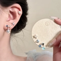 Detailed view of silver needle blue earring set with starfish and shell accents - 7# Silver and Blue (6 Pairs)