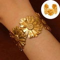 Golden stainless steel sunflower cuff bracelet featuring a textured multi-flower design - Radial Sunflower (11967)