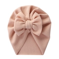 Soft peach pink baby turban hat with a large bow in ribbed knit fabric for infants - Snow Bud