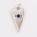 Silver heart-shaped pendant with dark blue evil eye gemstone and metal carvings - Silver Heart Blue Gem