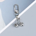 Detailed view of silver metal cherry keychain with a polished finish and lobster clasp - Silver Metal Cherry Shape Keychain