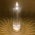 Bougie LED ciel étoilé avec texture en cristal et effet lumineux radial chaleureux - 6.3x18cm Grand avec Base / Transparent