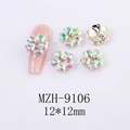 Macro shot of 12x12mm AB crystal flower nail art gems with five-petal heart-shaped design - Five-Petal Flower Pink with Green Style (9106)