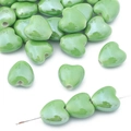 Pale green heart-shaped ceramic bead for DIY jewelry making with a smooth glazed finish - Green