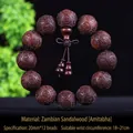 Macro view of sandalwood prayer beads with detailed carved Buddhist scriptures - High Density Blood Sandalwood 20mm*12 Beads [Amituofo Model]
