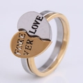 Dettaglio di anelli a cuore incastrati in oro e argento con incisione Love Forever - 5# Stile Puzzle Cuore Coppia