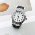 Detailed macro view of the silver alloy case and white dial with bold black numerals - Black Case White Dial Black Band